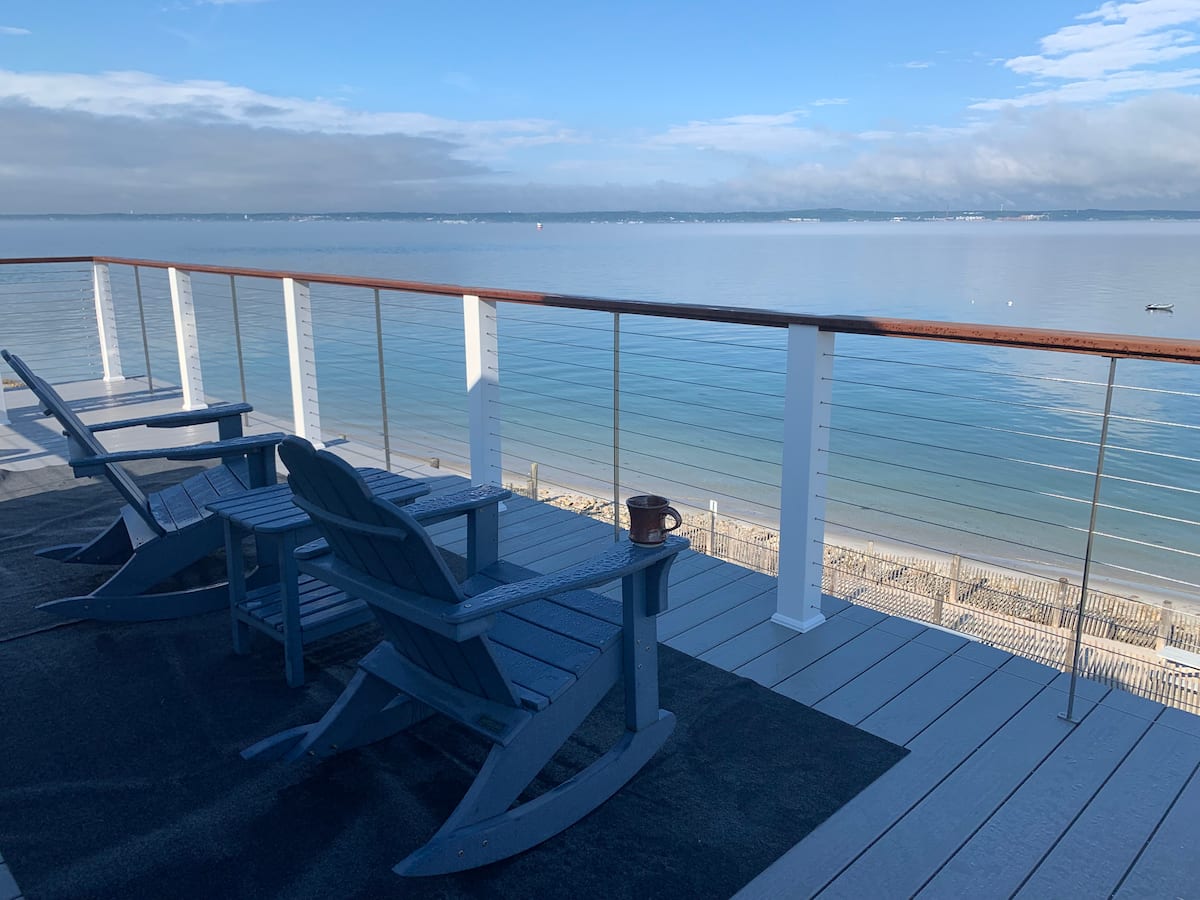 Chairs on the deck overlooking the water