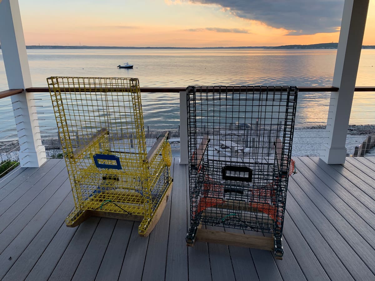 Deck chairs at sunset overlooking the bay